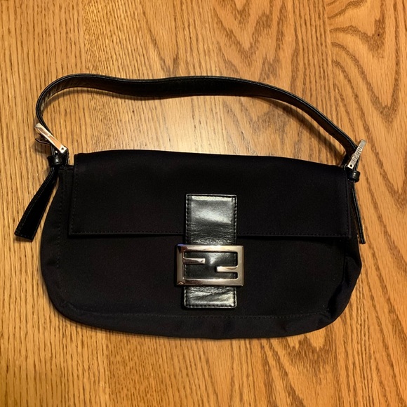 Fendi Handbags - Fendi handbag in the style “zucca baguette”